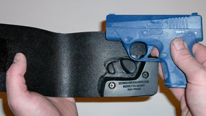 Wallet style top covered back pocket holster for licensed concealed weapon carry of Beretta Nano