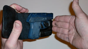 Wallet style top covered back pocket holster for licensed concealed weapon carry of Kel-Tec P3AT