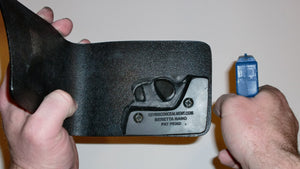 Wallet style top covered back pocket holster for licensed concealed weapon carry of Beretta Nano