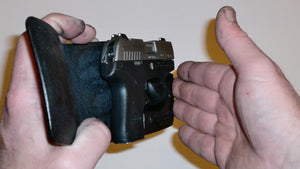 Wallet style top covered back pocket holster for licensed concealed weapon carry of Beretta Pico