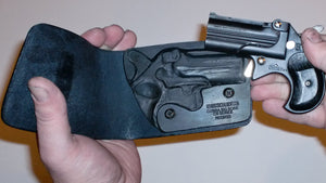 Wallet style top covered back pocket holster for licensed concealed weapon carry Cobra Derringer  