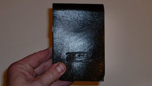 Wallet style top covered back pocket holster for licensed concealed weapon carry of Double Tap