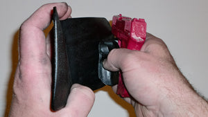 Wallet style top covered back pocket holster for licensed concealed weapon carry of Diamondback DB9
