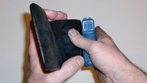 Wallet style top covered back pocket holster for licensed concealed weapon carry of Glock 26 27 33