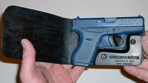 Wallet style top covered back pocket holster for licensed concealed weapon carry of Glock 42
