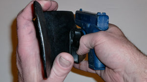 Wallet style top covered back pocket holster for licensed concealed weapon carry of Glock 42