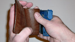 Wallet style top covered back pocket holster for licensed concealed weapon carry of Kahr P380