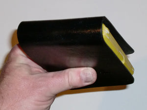 Wallet style top covered back pocket holster for licensed concealed weapon carry of Taurus Spectrum