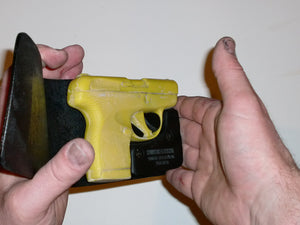 Wallet style top covered back pocket holster for licensed concealed weapon carry of Taurus Spectrum