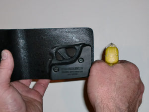 Wallet style top covered back pocket holster for licensed concealed weapon carry of Taurus Spectrum