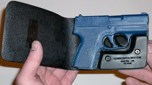 Wallet style top covered back pocket holster for licensed concealed weapon carry of Kahr PM9