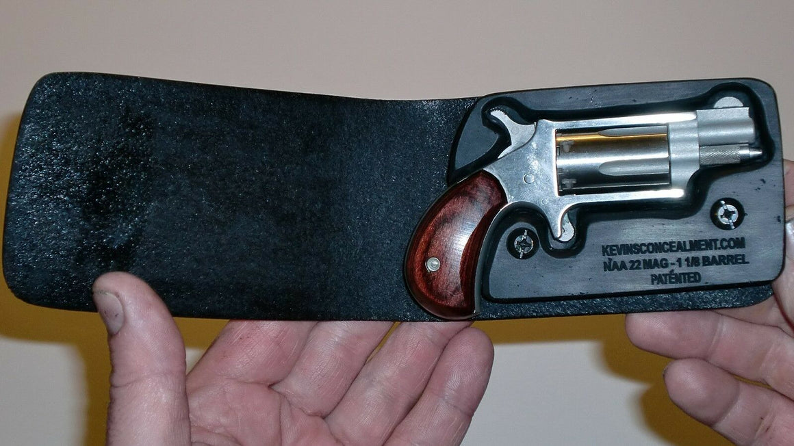 Wallet style top covered back pocket holster for licensed concealed weapon carry of NAA 22MS