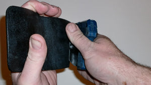 Wallet style top covered back pocket holster for licensed concealed weapon carry of Kel-Tec P3AT