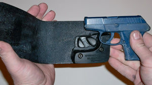 Wallet style top covered back pocket holster for licensed concealed weapon carry of Kel-Tec P3AT