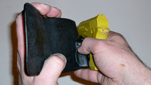 Wallet style top covered back pocket holster for licensed concealed weapon carry of Remington RM380