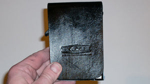 Wallet style top covered back pocket holster for licensed concealed weapon carry of Ruger LCPII