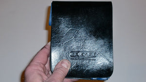 Wallet style top covered back pocket holster for licensed concealed weapon carry of S&W M&P Shield
