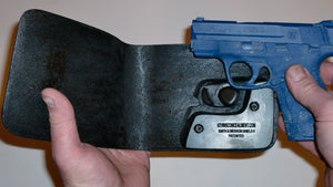 Wallet style top covered back pocket holster for licensed concealed weapon carry of S&W M&P Shield