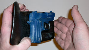 Wallet style top covered back pocket holster for licensed concealed weapon carry of Sig Sauer P238
