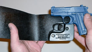 Wallet style top covered back pocket holster for licensed concealed weapon carry of Sig Sauer P238
