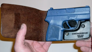 Wallet style top covered back pocket holster for licensed concealed weapon carry of Sig Sauer P290