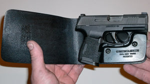 Wallet style top covered back pocket holster for licensed concealed weapon carry of Sig Sauer P365