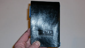 Wallet style top covered back pocket holster for licensed concealed weapon carry of Springfield XDS