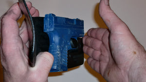 Wallet style top covered back pocket holster for licensed concealed weapon carry of Springfield XDS