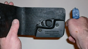 Wallet style top covered back pocket holster for licensed concealed weapon carry of Springfield XDS
