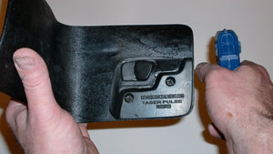 Wallet style top covered back pocket holster for licensed concealed weapon carry of Taser Pulse