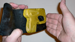 Wallet style top covered back pocket holster for licensed concealed weapon carry of Taurus Curve