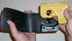 Wallet style top covered back pocket holster for licensed concealed weapon carry of Taurus Curve