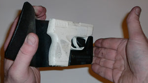 Wallet style top covered back pocket holster for licensed concealed weapon carry of Taurus TCP